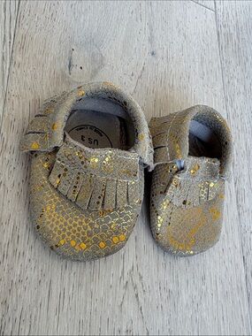 BirdRock Baby Gold Glitter Fringe Baby Moccasins with Metallic Accents